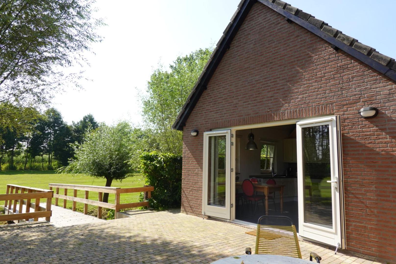 De Knotwilg Villa Loon op Zand Bagian luar foto